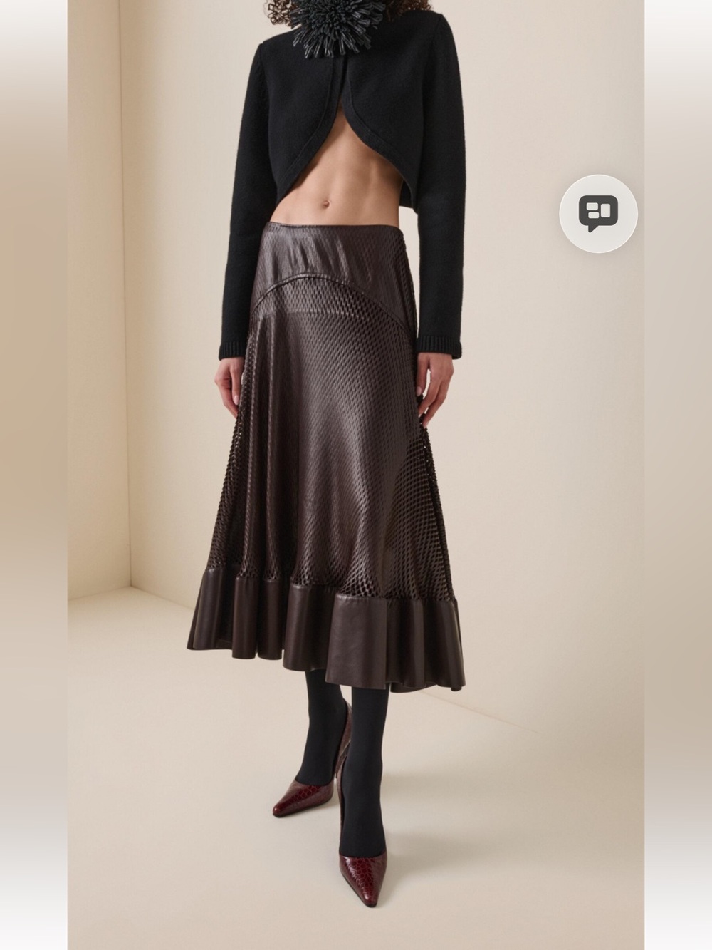 Alala Black Leaser- Cut Leather Skirt with Flared Ruffle Hem.